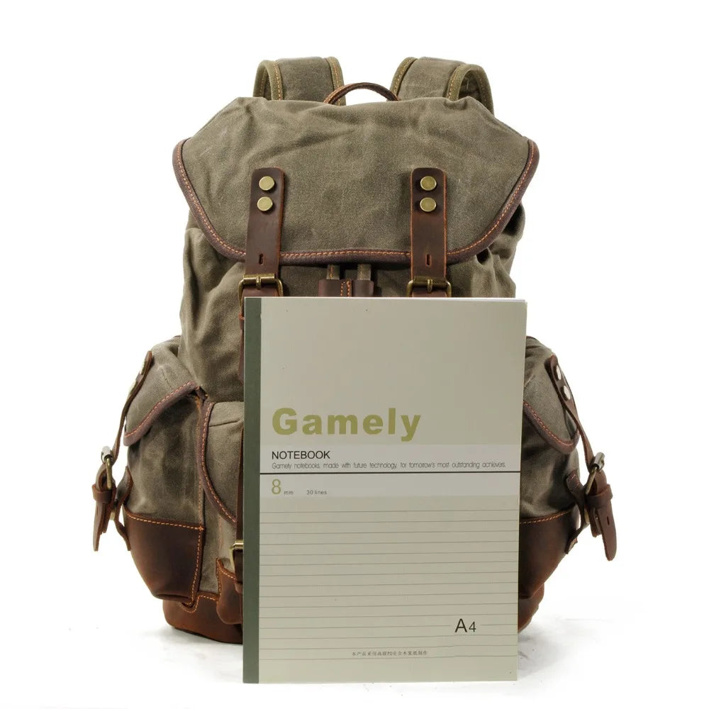Unisex Military Hiking Interior Zipper Canvas Leather Polyester Over Flap-Belt Design Backpacks/Single Laptop Compartment/ Shoulder Strap/Handles/Interior Pockets-External Pockets/Colors-Green/Gray/Brown/Black/Animal