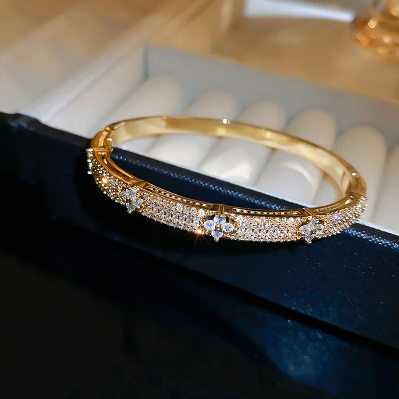 ANENJERY Imitation Women Gold Plated Copper Mood Tracker French Floral Four Leaf Clover Inlaid Shiny Zircon Bangle Bracelets