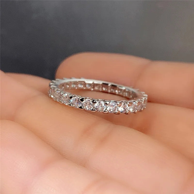 HUITAN Women Geometric Round Shaped Brass Shiny Crystal Silver Cubic Zirconia Promise Wedding Band Rings/Ring Sizes: 6-7-8-9-10/Colors-Silver/Geometric