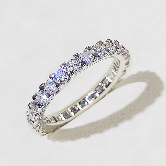 HUITAN Women Geometric Round Shaped Brass Shiny Crystal Silver Cubic Zirconia Promise Wedding Band Rings/Ring Sizes: 6-7-8-9-10/Colors-Silver/Geometric