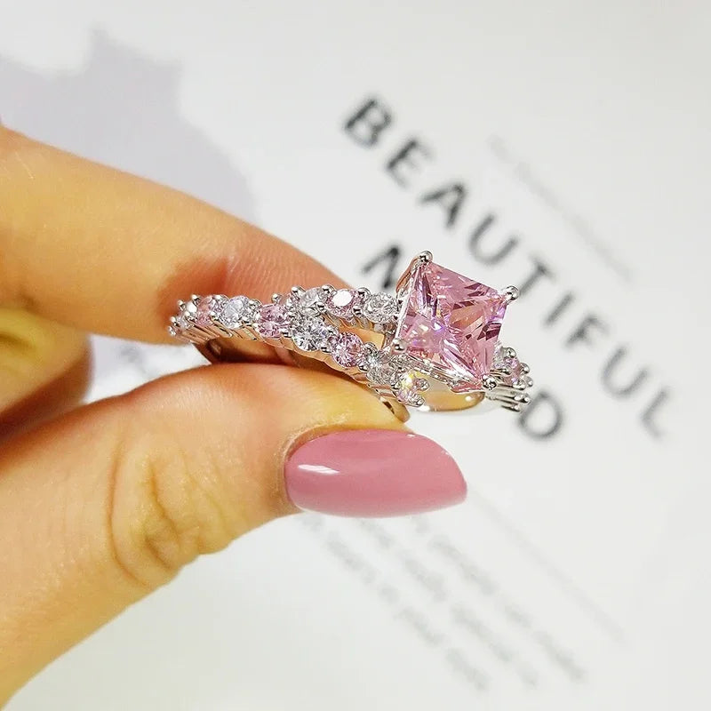 MOONSO 2 PCS Adult Women Fine Imitation Silver Copper Metal Large Princess-Cut Pink Cubic Zirconia Central Stone-Smaller White-Pink Stones Around It Bridal Wedding Round Solitaire Band Rings