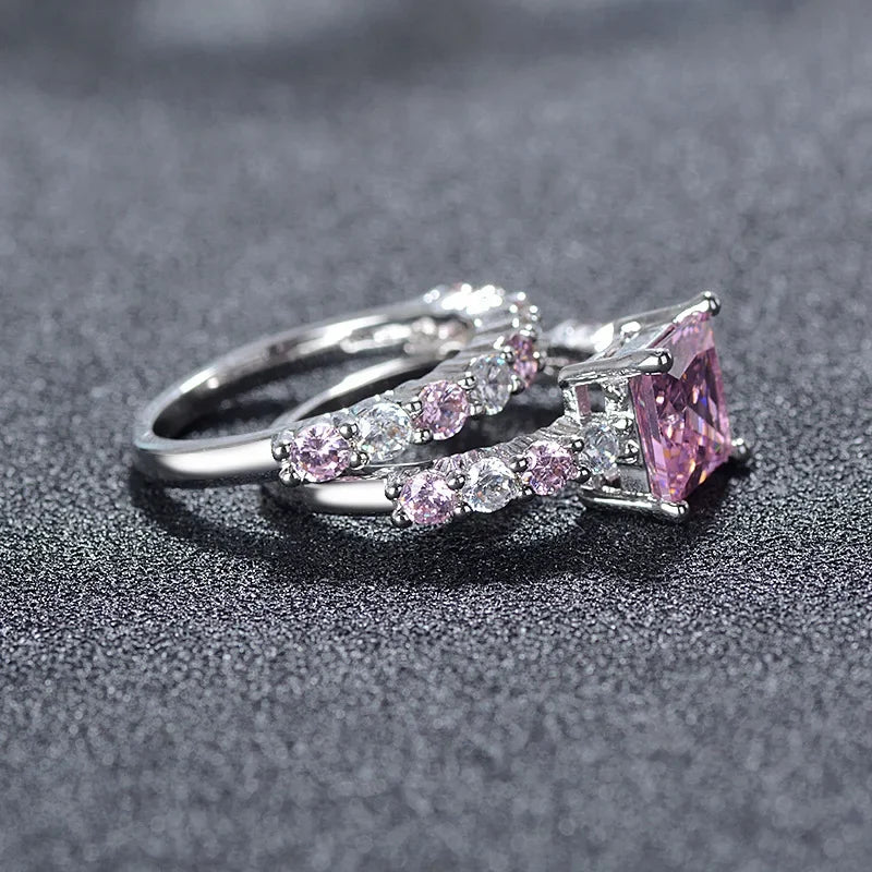 MOONSO 2 PCS Adult Women Fine Imitation Silver Copper Metal Large Princess-Cut Pink Cubic Zirconia Central Stone-Smaller White-Pink Stones Around It Bridal Wedding Round Solitaire Band Rings