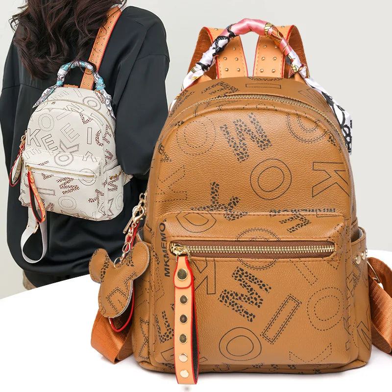 Women Disney's Waterproof Brown Faux Leather Geometric Letter Design Mickey Head Zipper Resin Mesh External Rear Pocket Detachable Straps-Handle Built-In Single 7.9 IPAD Compartment External Frame School Backpacks/Colors-Brown/Beige/Black